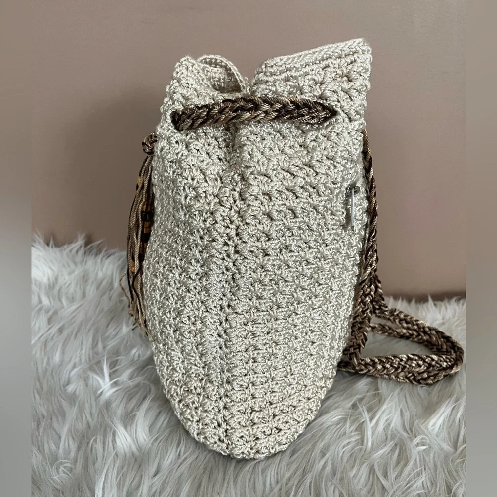 {The SAK} Crochet Drawstring Backpack Purse in Ivory